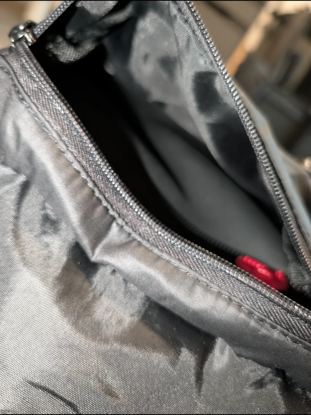 Herschel Supply Company Black Sling Bag with Red Accent Pull